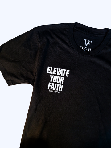 Black t-shirt with 'Elevate Your Faith' text on a white background